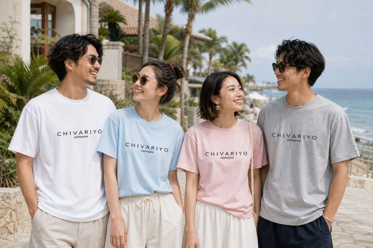 沖縄の海沿いでSHIMAWARIのロゴTシャツを着たグループ